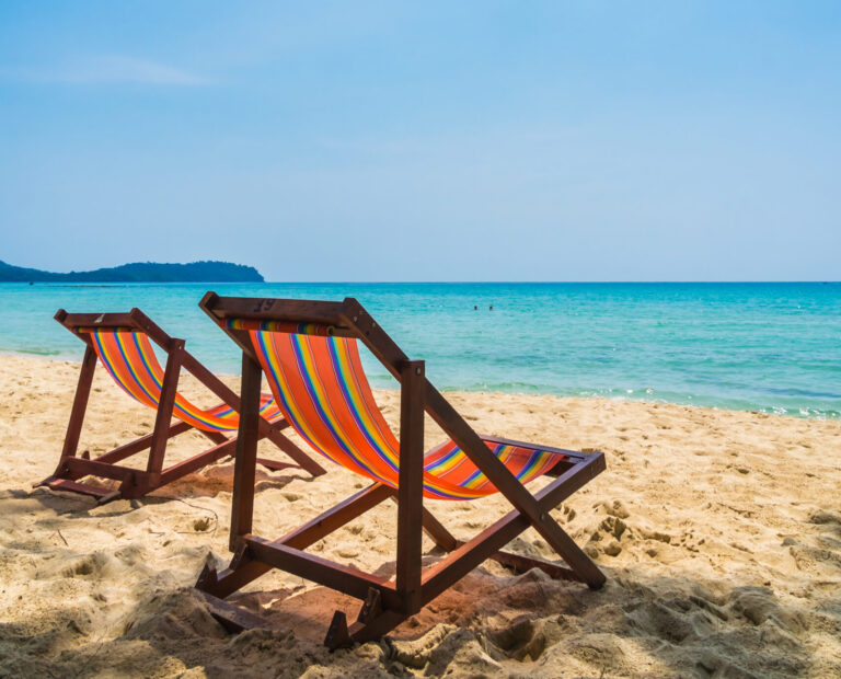 Empty chair on the beach and sea in beautiful island - Holiday Vacation concept